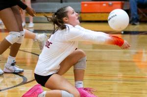 Monroes Maddie Walker digs the ball during the game against Snohomish on Wednesday, Oct. 16, 2024 in Monroe, Washington. (Olivia Vanni / The Herald)
