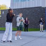 People walk through the Explorer Middle School locker rooms in their new athletics building on Oct. 7, 2025 in Everett, Washington. (Olivia Vanni / The Herald)