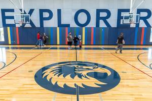 People walk through Explorer Middle School’s new gymnasium during an open house on Oct. 7, 2025 in Everett, Washington. (Olivia Vanni / The Herald)