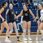 Kamiak players celebrate after scoring a point against Glacier Peak on Tuesday, Oct. 7, 2025 in Snohomish, Washington. (Olivia Vanni / The Herald)