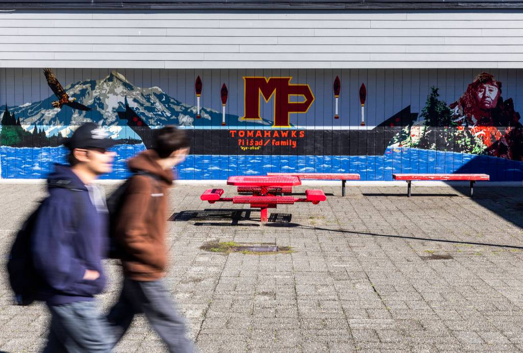 Students walk by a new mural on the Marysville Pilchuck High School campus on Oct. 14, 2025 in Marysville, Washington. (Olivia Vanni / The Herald)
