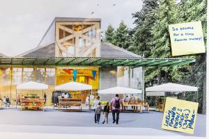 People leave notes on farmers market concept photos during an informational open house held at the Northwest Stream Center on Oct. 9, 2025 in Everett, Washington. (Olivia Vanni / The Herald)