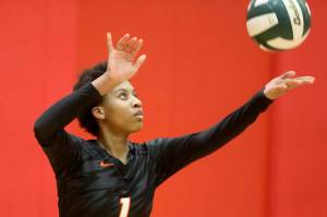 Monroe sophomore Shannara Peebles serves the ball during a District 1 3A quarterfinals match against Monroe in Stanwood, Wash., on Tuesday, Nov. 12, 2024. The Spartans won 3-1. (Taras McCurdie / The Herald)