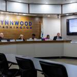 The Lynnwood City Council listens to a presentation on the development plan for the Lynnwood Event Center during a city council meeting on Oct. 13, 2025 in Lynnwood, Washington. (Olivia Vanni / The Herald)
