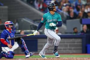 Jorge Polanco (7) of the Seattle Mariners hits a three-run home run against the Toronto Blue Jays during the fifth inning in game two of the American League Championship Series at Rogers Centre on October 13, 2025 in Toronto. (Photo by Vaughn Ridley / Getty Images / The Athletic)