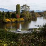 Cars sit in the parking lot of Lowell Riverfront Park next to the Snohomish River on Oct. 21, 2025 in Everett, Washington. (Olivia Vanni / The Herald)