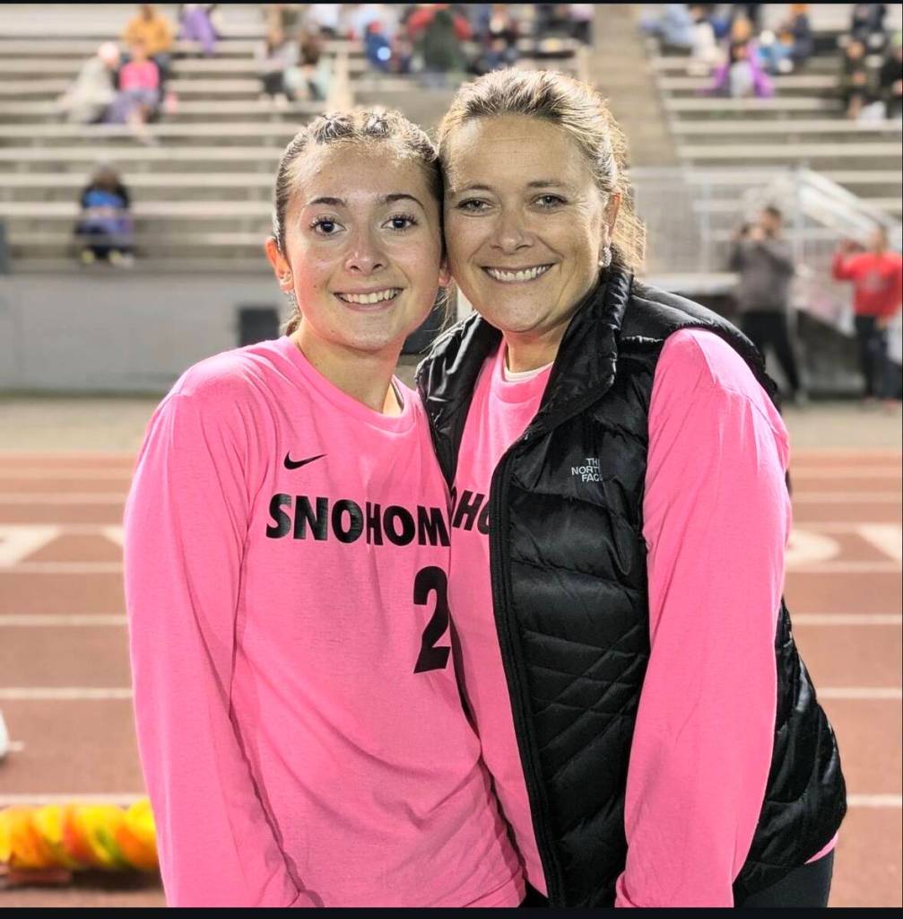 Hailey Kendall (left) and Megan Kendall (right) pose for a photo ahead of the 2024 Kick for the Cure game at Snohomish High School in Snohomish. (Photo courtesy of Megan Kendall)