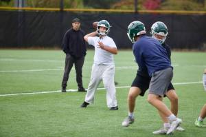 Edmonds-Woodway sophomore George Gizzi throws a pass during a walk-through practice at Edmonds-Woodway High School on Oct. 20, 2025. (Joe Pohoryles / The Herald)