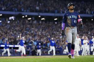 Julio Rodriguez (44) of the Seattle Mariners reacts after striking out to end game seven of the American League Championship Series against the Toronto Blue Jays at the Rogers Centre on October 20, 2025 in Toronto. (Photo by Mark Blinch / Getty Images / The Athletic)