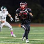 Mountlake Terraces Owen Boswell runs the ball up the field during the game against Edmonds-Woodway on Oct. 23, 2025 in Edmonds, Washington. (Olivia Vanni / The Herald)