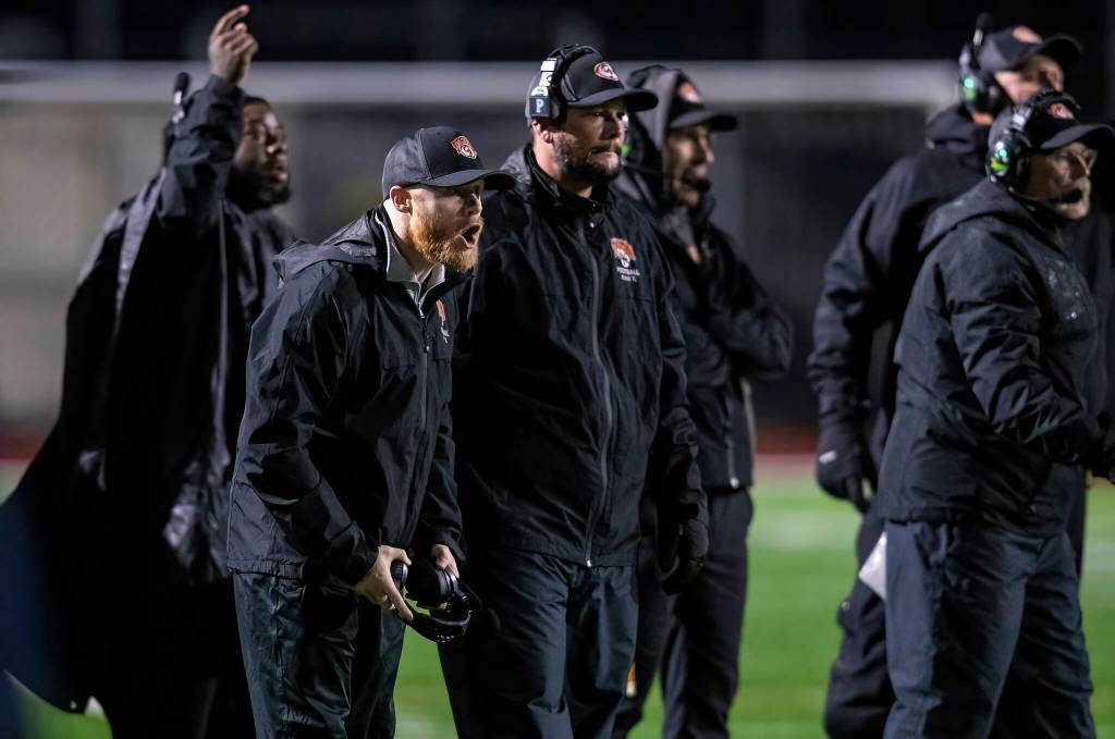 Granite Falls coaches react to a call by the referee during the game against Cedar Park Christian on Oct. 24, 2025 in Kirkland, Washington. (Olivia Vanni / The Herald)