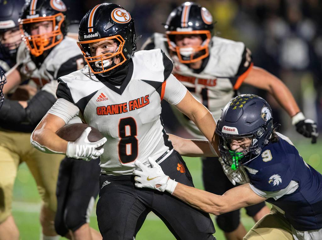 Granite Falls Drake Smith runs the ball into the end zone for a touchdown during the game against Cedar Park Christian on Oct. 24, 2025 in Kirkland, Washington. (Olivia Vanni / The Herald)