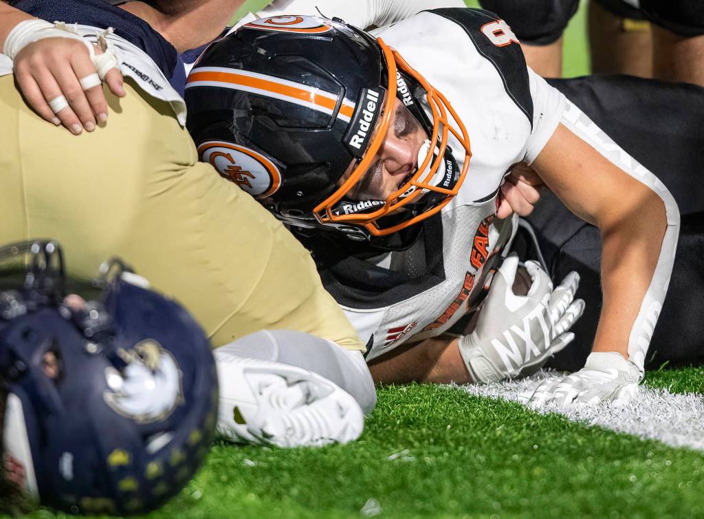 Granite Falls Drake Smith looks up after crossing into the end zone for a touchdown during the game against Cedar Park Christian on Oct. 24, 2025 in Kirkland, Washington. (Olivia Vanni / The Herald)
