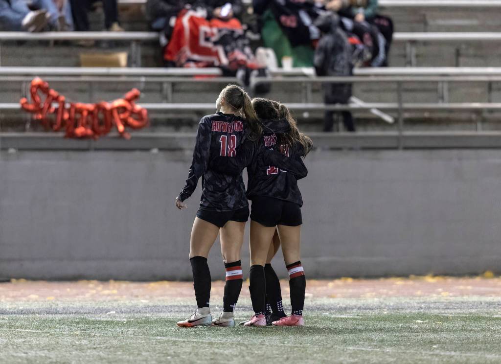 Snohomish players pose for a photo after a goal during the game against Stanwood on Oct. 27, 2025 in Snohomish, Washington. (Olivia Vanni / The Herald)