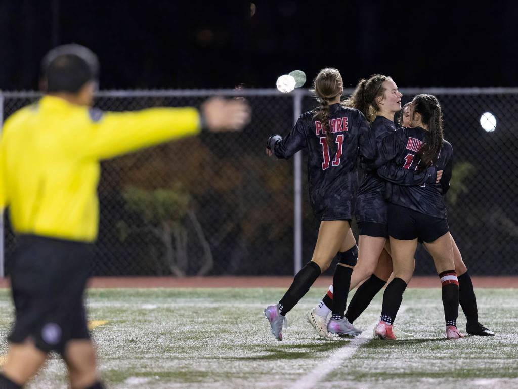 Snohomishs Lizzie Allyn celebrates he goal with her teammates during the game against Stanwood on Oct. 27, 2025 in Snohomish, Washington. (Olivia Vanni / The Herald)