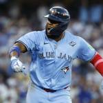 Vladimir Guerrero Jr. (27) of the Toronto Blue Jays celebrates after hitting a two-run home run in the third inning against the Los Angeles Dodgers in game four of the 2025 World Series at Dodger Stadium on Tuesday in Los Angeles. (Photo by Ronald Martinez / Getty Images / The Athletic)