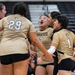 Lynnwood players react to scoring a point during the game against Edmonds-Woodway on Oct. 29, 2025 in Edmonds, Washington. (Olivia Vanni / The Herald)