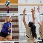 Edmonds-Woodways Calla Camp spikes the ball over the net during the game against Edmonds-Woodway on Oct. 29, 2025 in Edmonds, Washington. (Olivia Vanni / The Herald)