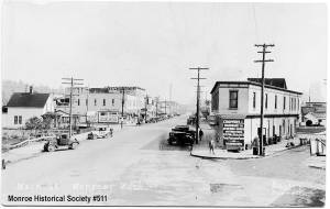 The Hallan Building and Main Street early in the 20th century. (Monroe Historical Society)