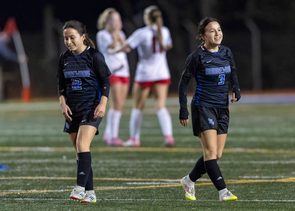 Shorewoods Rilan Fly and Maily Fly smile after beating Mountlake Terrace in the 3A district game on Oct. 30, 2025 in Shoreline, Washington. (Olivia Vanni / The Herald)