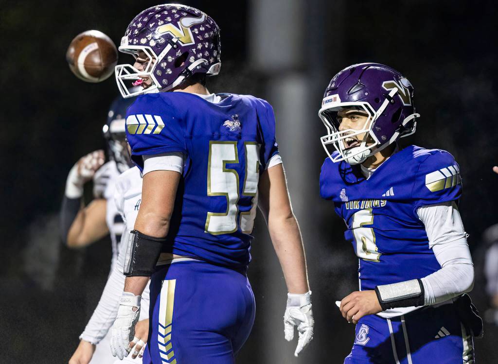 Lake Stevens Blake Moser yells in celebration after a touchdown during the game against Arlington on Oct. 31, 2025 in Lake Stevens, Washington. (Olivia Vanni / The Herald)