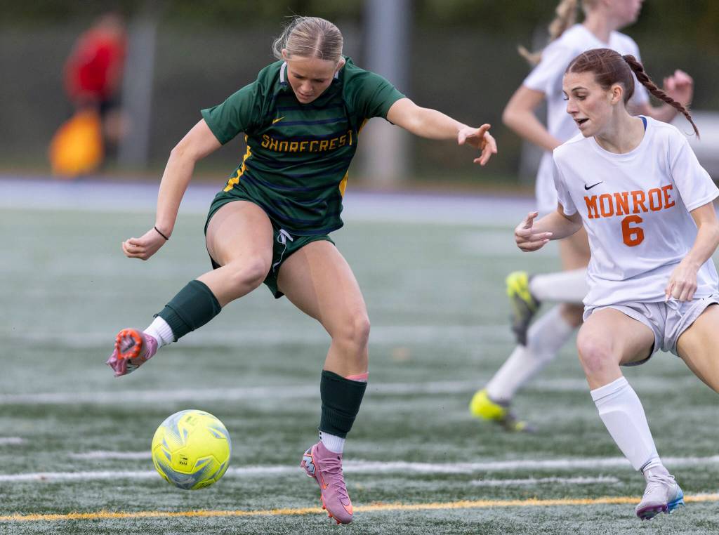 Shorecrests Pip Watkinson crosses over the ball during the 3A girls district game against Monroe on Nov. 4, 2025 in Shoreline, Washington. (Olivia Vanni / The Herald)