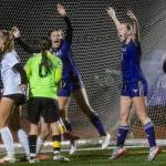 Lake Stevens Cora Jones yells in unison with teammate Carley Robertson after scoring a goal during the 4A girls district game against Jackson on Nov. 5, 2025 in Lake Stevens, Washington. (Olivia Vanni / The Herald)