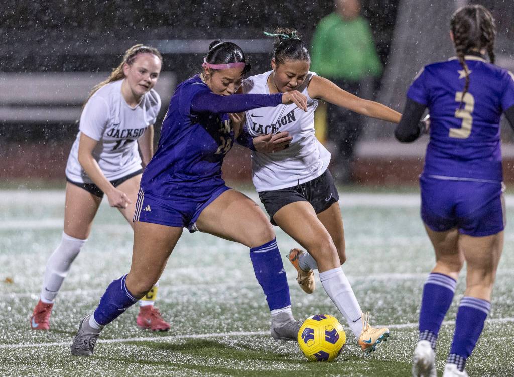 Jacksons Mailynn Jeffries and Lake Stevens Keira Isabelle Tupua battle for the ball during the 4A girls district game on Nov. 5, 2025 in Lake Stevens, Washington. (Olivia Vanni / The Herald)