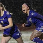 Lake Stevens’ Keira Isabelle Tupua and Carley Robertson yell in celebration after Lake Stevens’ Noelani Tupua scores during the 4A girls district game against Jackson on Nov. 5, 2025 in Lake Stevens, Washington. (Olivia Vanni / The Herald)
