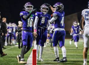 Lake Stevens' Blake Moser (6) celebrates his touchdown during the game against Arlington on Oct. 31, 2025 in Lake Stevens, Washington. (Olivia Vanni / The Herald)