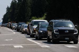 Cars headed north on Highway 9 line up south of the light at 30th Street on Friday, July 9, 2021 in Snohomish, Wa. (Olivia Vanni / The Herald)