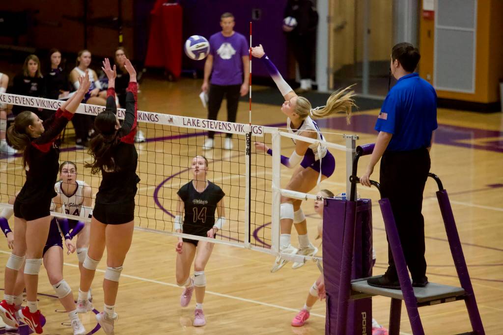 Lake Stevens senior Laura Eichert gets a kill during the Vikings 3-0 win against Mount Si in the District 1/2 4A semifinals at Lake Stevens High School on Nov. 13, 2025. (Joe Pohoryles / The Herald)
