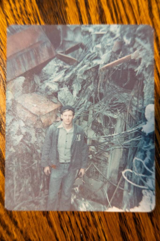 A photo of Roger Sharp standing in the USS Belknap after the collision. (Will Geschke / The Herald)