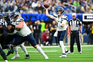 Seahawks guard Gray Zabel (76) for Sam Darnold (14) during Seattle's game against the Los Angeles Rams at SoFi Stadium in Inglewood, California on Sunday, Nov. 16, 2025. (Photo courtesy of the Seattle Seahawks)