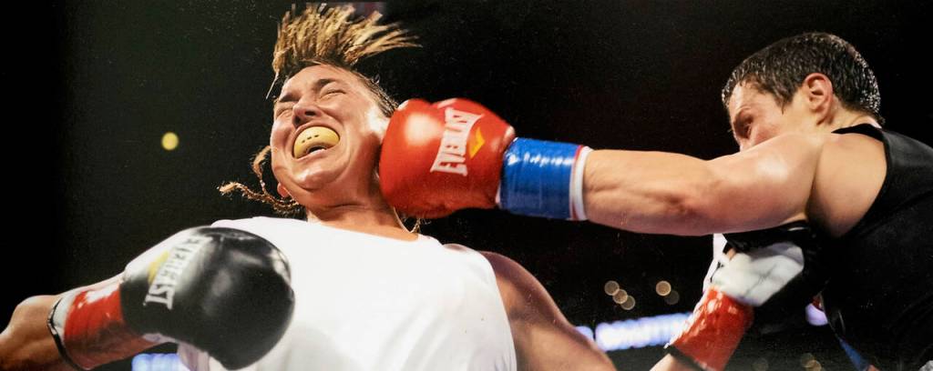 Photos by David Welton
This photo of a photo from Ring magazine shows Dakota Stone landing a blow to Christy Martin in their fight.