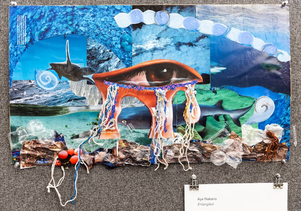 Climate change themed student art on display as a part of the national exhibit on Nov. 19, 2025 in Lynnwood, Washington. (Olivia Vanni / The Herald)
