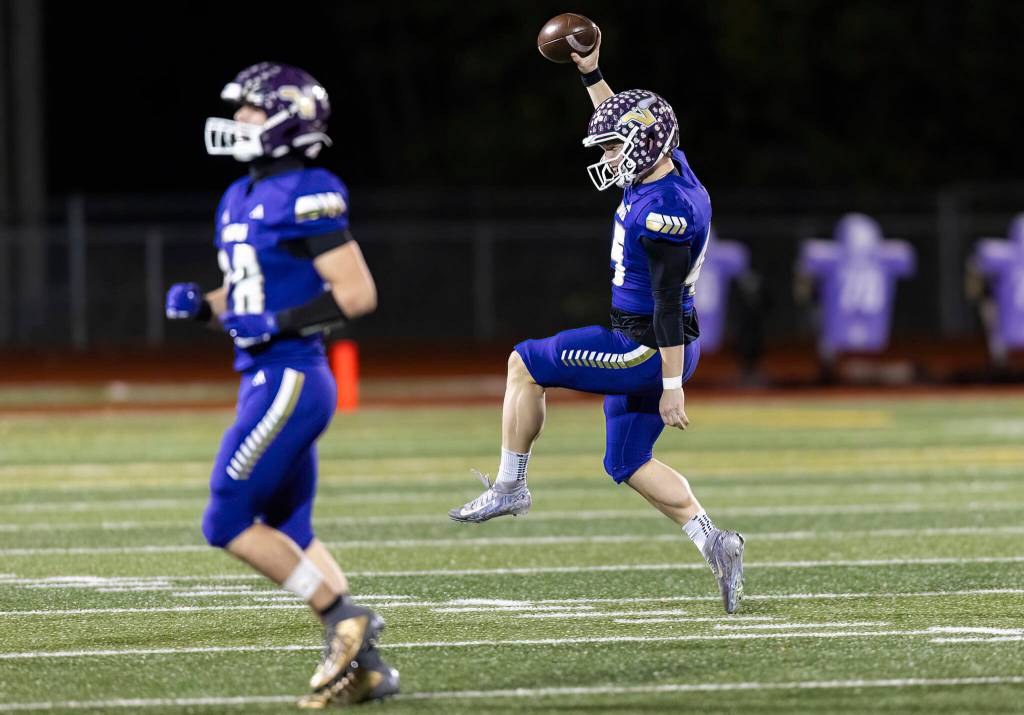 Lake Stevens Lucas Mooring reacts to recovering the ball during an onside kick during the 4A state football quarterfinal game against Moses Lake on Nov. 22, 2025 in Lake Stevens, Washington. (Olivia Vanni / The Herald)