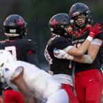 Archbishop Murphys Henry Gabalis celebrates his touchdown during the 2A state football semifinal game against Anacortes on Nov. 29, 2025 in Everett, Washington. (Olivia Vanni / The Herald)