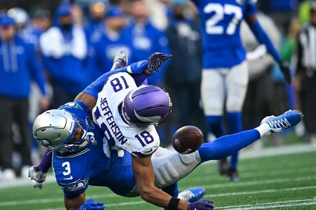 Seahawks safety Nick Emmanwori (3) knocks the ball loose against Minnesota Vikings receiver Justin Jefferson in a game at Lumen Field in Seattle, Washington on Sunday, Nov. 30, 2025. (Photo courtesy of the Seattle Seahawks)