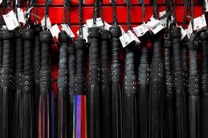 A selection of leather whips available at Lovers Lair on Friday, Dec. 19, 2025 in Everett, Washington. (Olivia Vanni / The Herald)