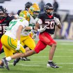 Archbishop Murphys Isaiah Smith runs the ball during the 2A state championship game against Tumwater at Husky Stadium on Saturday, Dec. 6, 2025 in Seattle, Washington. (Olivia Vanni / The Herald)