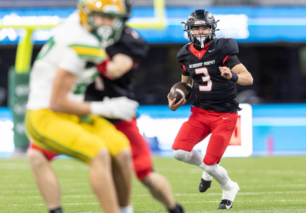 Archbishop Murphys Evan Ruiz runs with the ball during the 2A state championship game against Tumwater at Husky Stadium on Saturday, Dec. 6, 2025 in Seattle, Washington. (Olivia Vanni / The Herald)