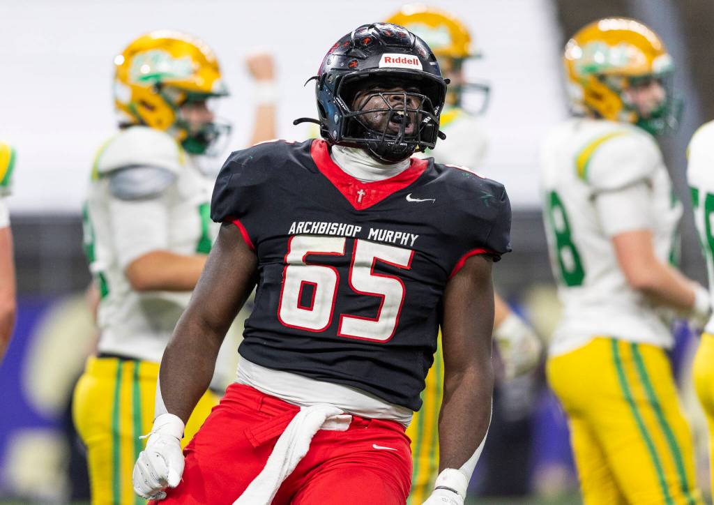 Archbishop Murphys Hakeim Smalls reacts to getting a stop on fourth down during the 2A state championship game against Tumwater at Husky Stadium on Saturday, Dec. 6, 2025 in Seattle, Washington. (Olivia Vanni / The Herald)