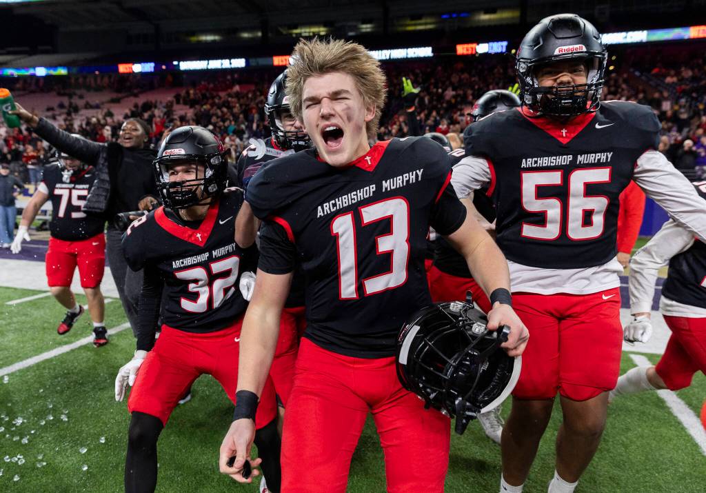 Archbishop Murphys EJ Manning yells after winning the 2A state championship game against Tumwater at Husky Stadium on Saturday, Dec. 6, 2025 in Seattle, Washington. (Olivia Vanni / The Herald)