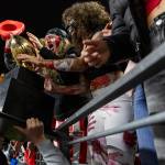 Archbishop Murphy fans react to seeing the 2A state championship trophy at Husky Stadium on Saturday, Dec. 6, 2025 in Seattle, Washington. (Olivia Vanni / The Herald)