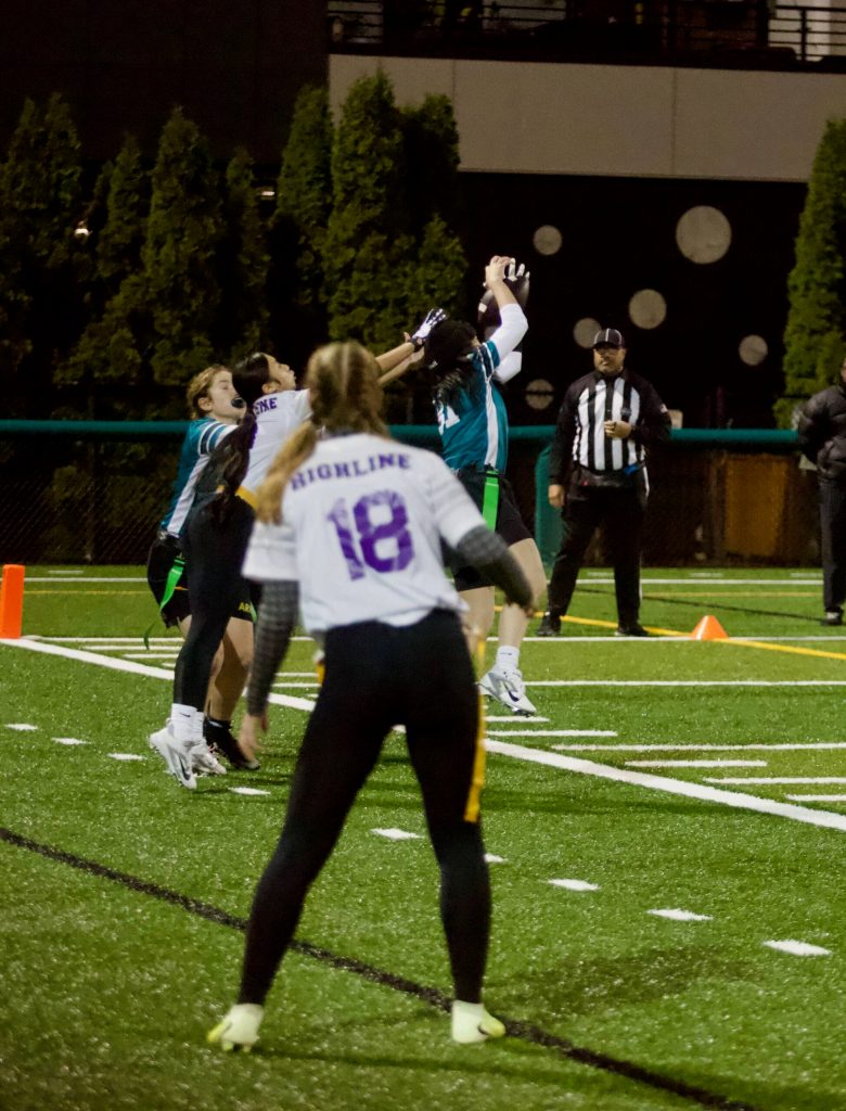 Jackson junior Erica Yong jumps to secure a touchdown catch in the Timberwolves 23-7 win against Highline at Pop Keeney Stadium on Dec. 11, 2025. (Joe Pohoryles / The Herald)