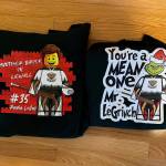 The Another Brick in LeWall and LeGrinch merchandise, designed by Justin Morison, laid out side by side. (Photo courtesy Tim Morison)