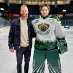 Silvertips goalie Raiden LeGall (right) stands with his hometown goalie coach Tim Morison on the ice at Angel of the Winds Arena. (Photo courtesy of Tim Morison)