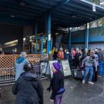People gather at the Jean Kim Foundation Hygiene Center on Wednesday, Dec. 17, 2025 in Lynnwood, Washington. (Olivia Vanni / The Herald)