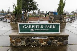 The southeast entrance to Garfield Park on Thursday, Dec. 18, 2025 in Everett, Washington. (Olivia Vanni / The Herald)